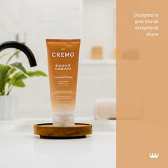Cremo coconut mango shaving cream foam dispensed for ultra-slick glide