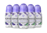 Crystal Essence desodorante mineral roll-on lavanda y té blanco en botella, aroma relajante para diario.
