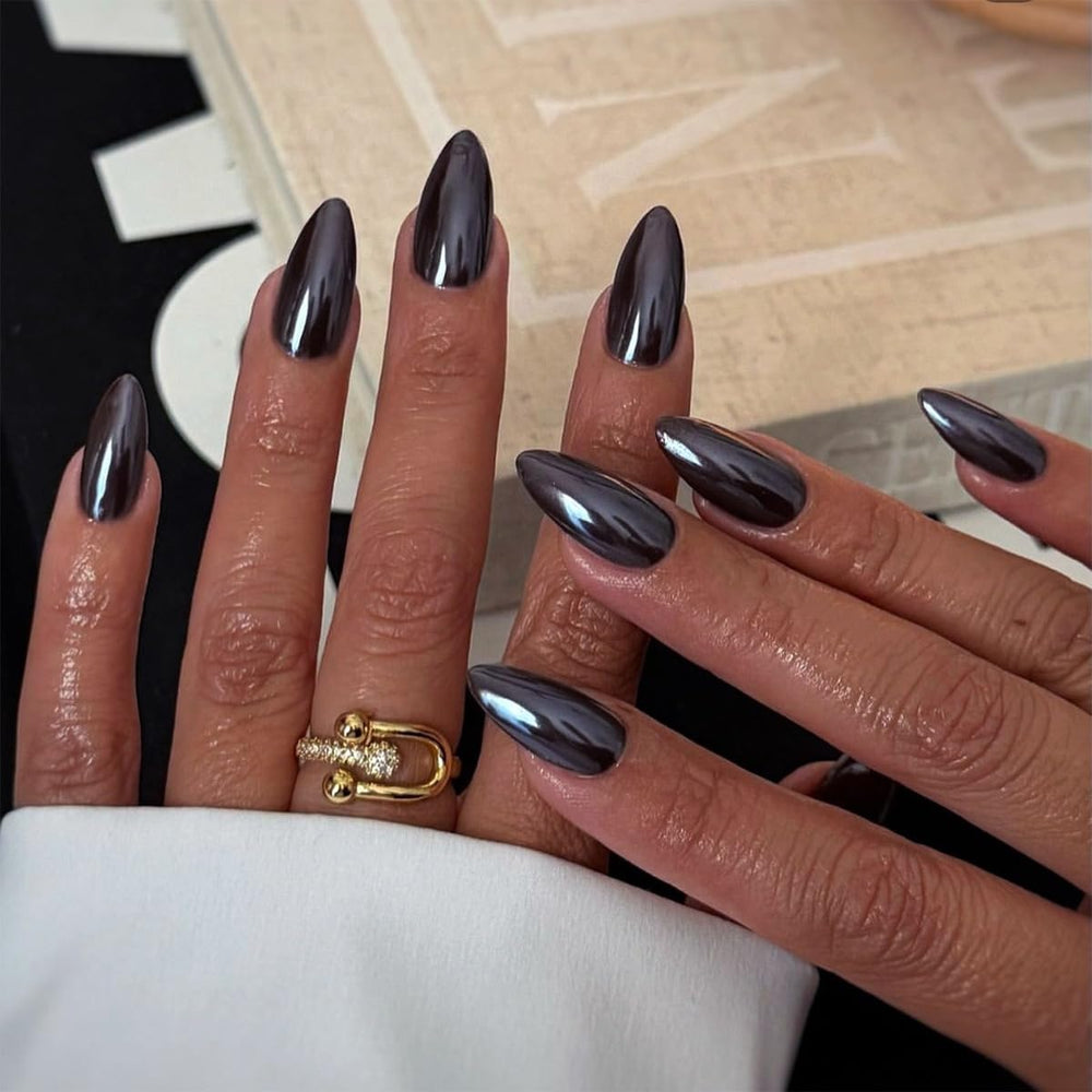 CTTHNBD black almond press-on nails with chrome design for a quick, glamorous manicure.