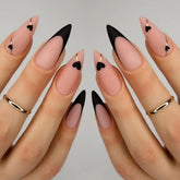 CTTHNBD black French tip nails with gold line for chic evening looks