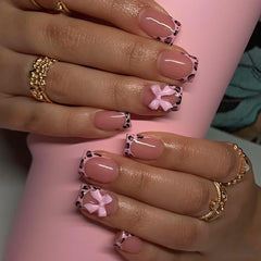 CTTHNBD leopard nails with pink bow for at-home salon-quality manicure