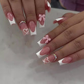 CTTHNBD coffin pink bow heart press-on nails for a chic at-home manicure.