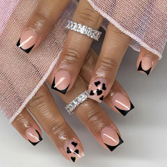 CTTHNBD short press on nails square with black French tip and heart design for at-home chic.