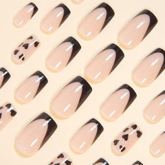 CTTHNBD square nails with black French tips and heart design for elegant events.