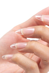 Cuccio Pro builder gel application demonstrates precise brush-on technique for shaping.