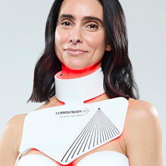 CurrentBody Skin LED Neck mask Series 2 worn on model for chest coverage.