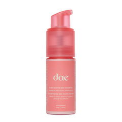 DAE Fairy Duster dry shampoo powder packaging in recyclable bottle for on-the-go refresh.