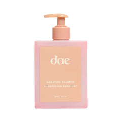 DAE Signature Shampoo bottle front, showcasing gentle cleansing for dry hair.