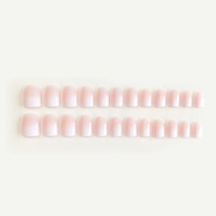 DANMANR nails close-up showing white pink French tips for a chic look