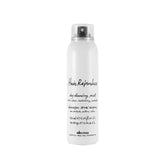 Davines Hair Refresher Dry Shampoo bottle with rice starch absorbs oil for instant lift.