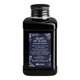 Davines Heart of Glass bottle showing silkening formula for blonde care.