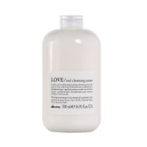 Davines LOVE Curl Cleansing Cream bottle pour shows light cleansing for soft, defined curls.