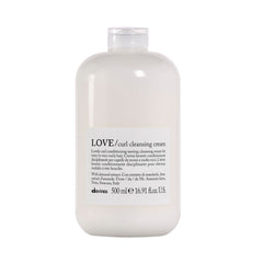 Davines LOVE Curl Cleansing Cream bottle pour shows light cleansing for soft, defined curls.