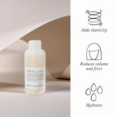 Davines Love Curl Controller applied to damp hair to define curls.