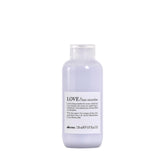 Davines LOVE Hair Smoother Cream bottle for smooth, frizz-free hair without weighing down.