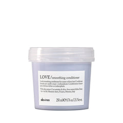 Davines Love Smoothing Conditioner bottle ready to tame frizz