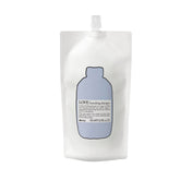 Davines Love Smoothing Shampoo bottle front showing frizz control and shine.