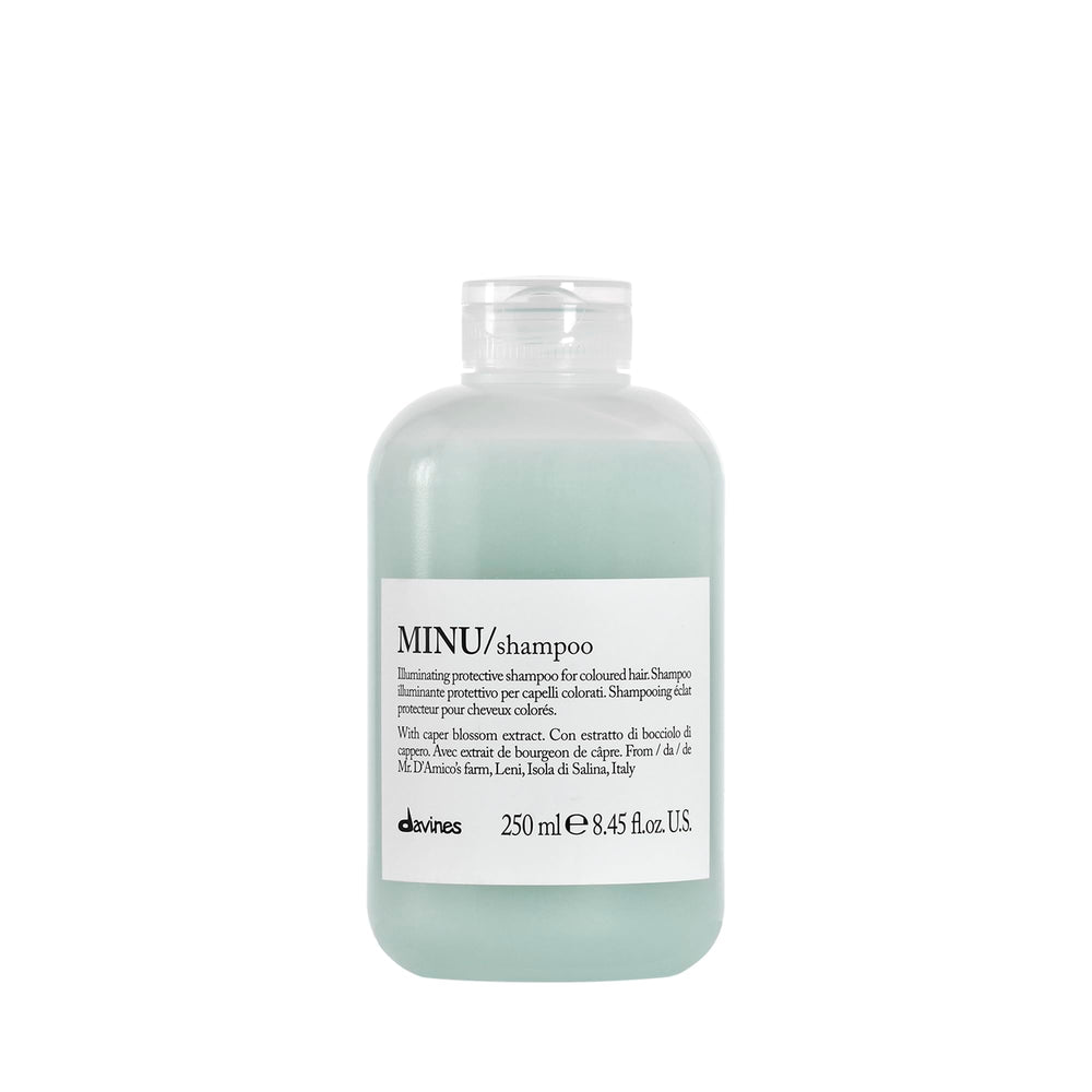 Davines MINU shampoo bottle highlights color protection benefit.