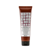 Davines Naturaltech Replumping Conditioner bottle boosts elasticity and detangles.