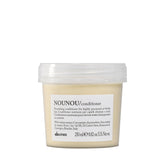 Davines NOUNOU conditioner bottle front highlights deep hydration for chemically treated hair.