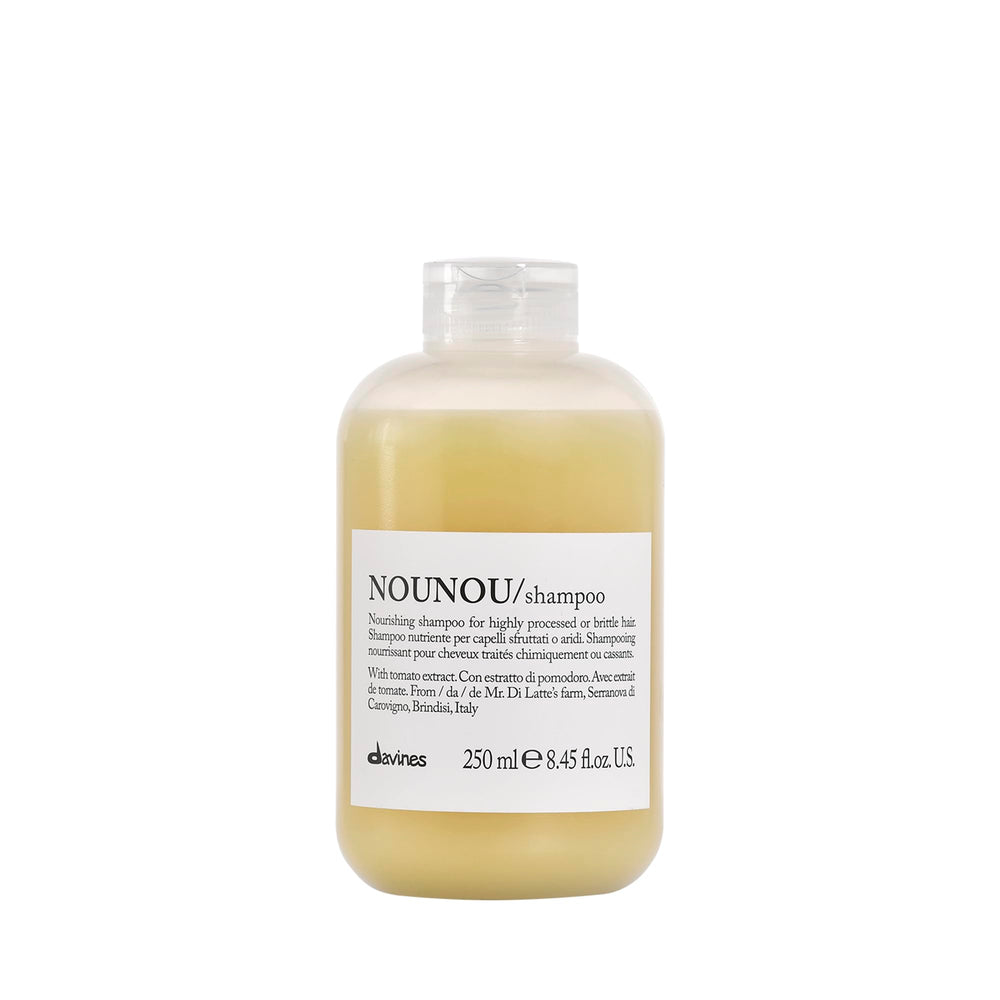 Davines NOUNOU shampoo bottle pour demonstrates gentle cleansing for damaged hair.