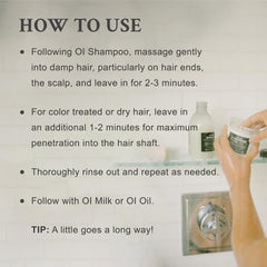 Davines OI Conditioner apply hair section demonstrates easy distribution