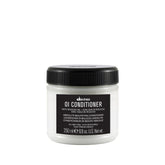 Davines OI Conditioner bottle side view shows smoothing care for hair