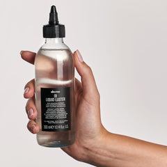 Davines OI Liquid Luster pour improves instant gloss on damp hair.