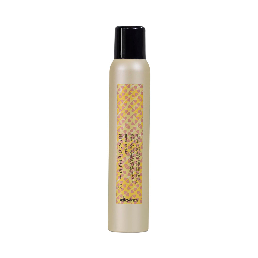 Davines This Is A Dry Wax Finishing Spray for controlled undone texture.