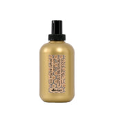 Davines This Is A Sea Salt Spray bottle close-up showing matte finish texture for beach-ready style.