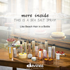 Hair with enhanced texture and natural waves using Davines sea salt spray.