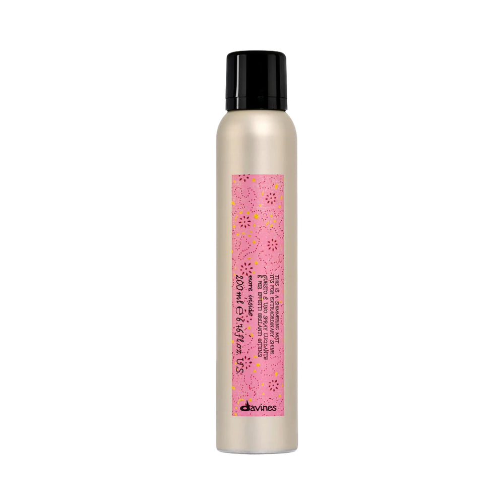 Davines This Is A Shimmering Mist bottle glowing with instant shine.