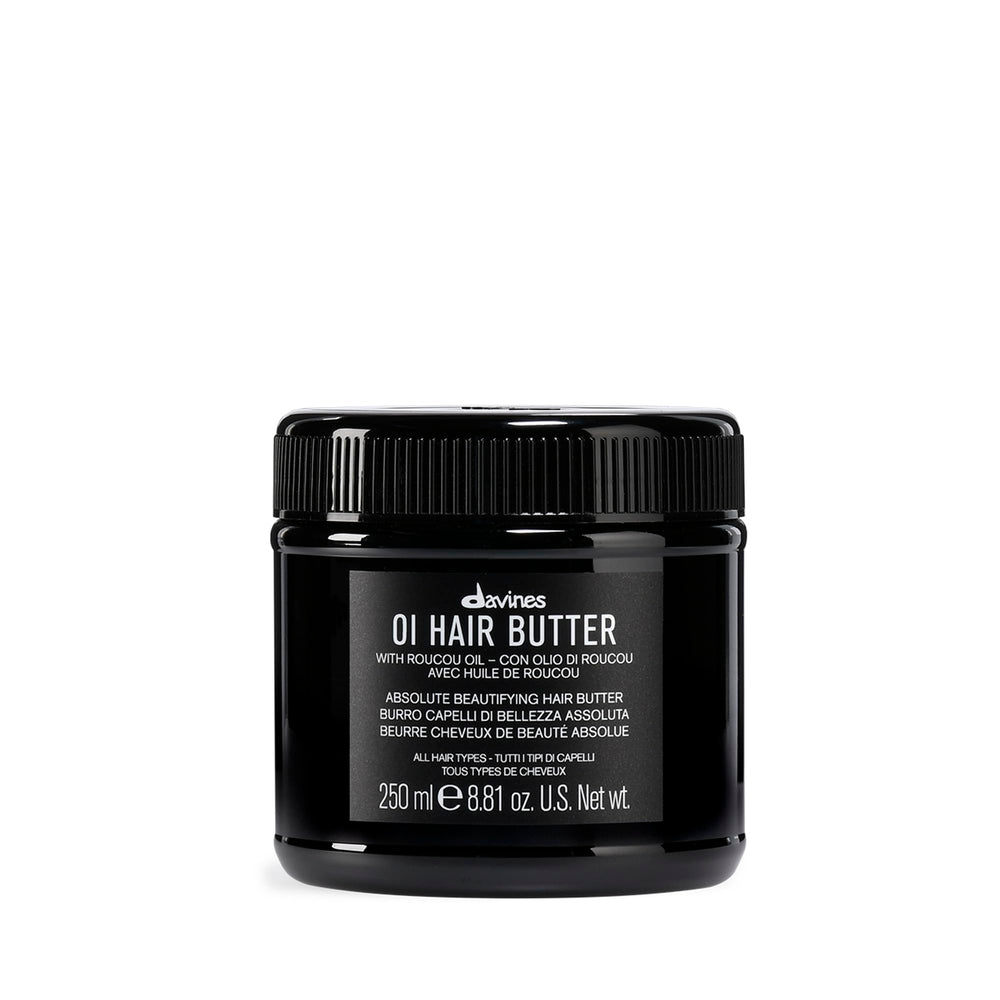 Davines OI Hair Butter jar close-up showing rich, nourishing texture for smooth, frizz control