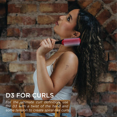 Denman D3 round-ended nylon pins closeup for gentle detangling on wet curls.