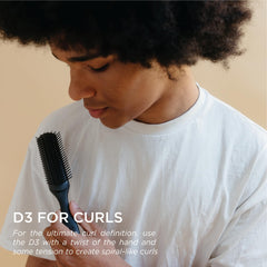 Denman Jack Dean D3 styling brush defines curls and shapes for a polished look.