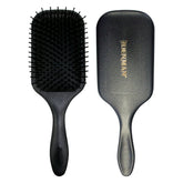 Denman large paddle cushion brush close-up showing soft nylon bristles for gentle detangling.