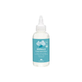 DERMA-E enjuague exfoliante capilar en botella limpia suavemente y equilibra el cuero cabelludo