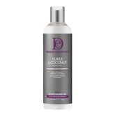 Acondicionador sin enjuague Design Essentials Kukui & Coconut, botella derramando, hidratación intensa para cabello seco.