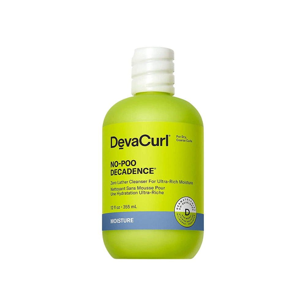 DevaCurl No-Poo Decadence bottle on green oasis, delivering ultra-rich moisture for dry curls.