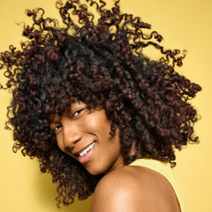 Devacurl No-Poo Original bottle label close-up showing non-lather cleansing.