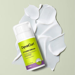 DevaCurl Styling Cream dispensing pump shows easy application for defined curls.