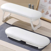 Diesisa nail arm rest folded white shows compact, space-saving design for small stations.