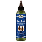 Difeel Progrowth bottle pour shows weightless oil for easy application.