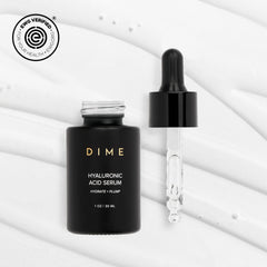 DIME Beauty serum dropper close-up delivering precise hydration droplets.