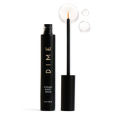 DIME Eyelash Boost Serum bottle close-up showing nourishing formula for healthier lashes