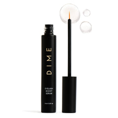 DIME Eyelash Boost Serum bottle close-up showing nourishing formula for healthier lashes