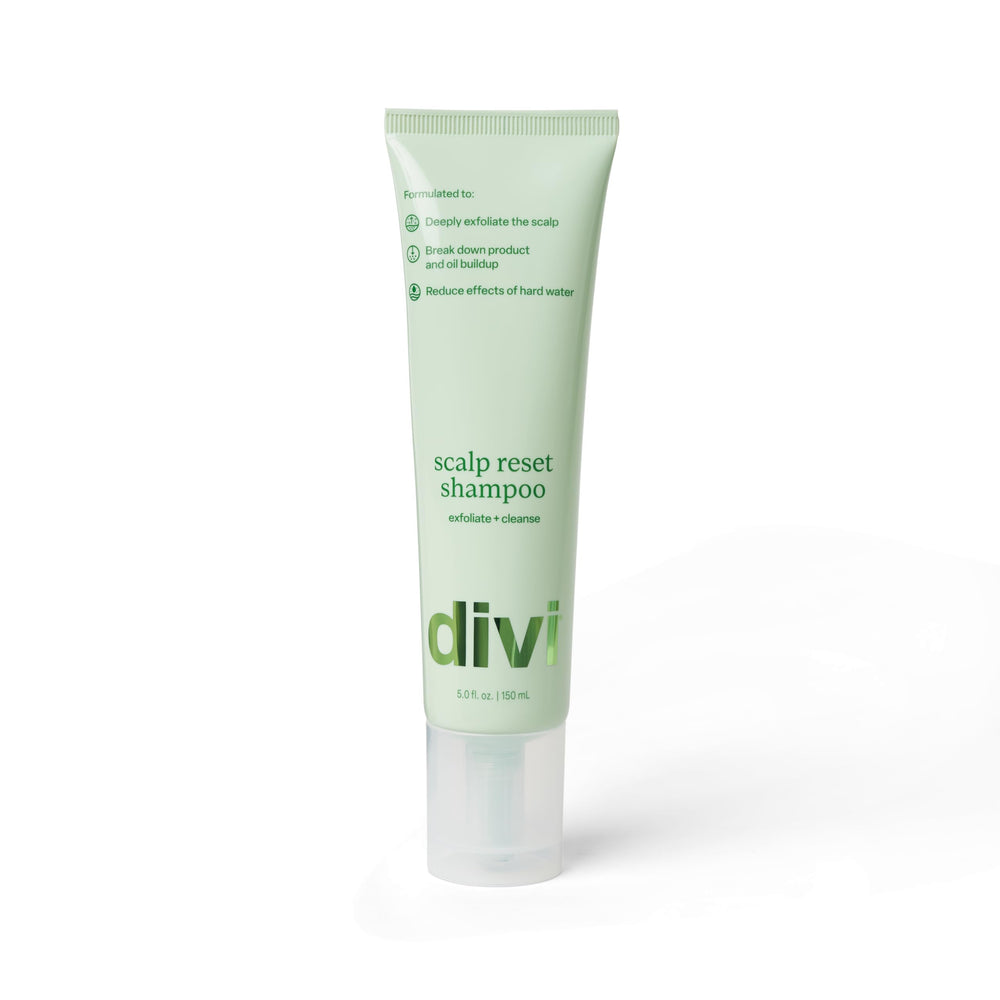 Divi Clarifying Scalp Reset Shampoo bottle being poured for a weekly deep cleanse