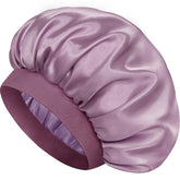 Doitory satin silk bonnet for sleeping with outer layer; reduces friction and protects natural shine.