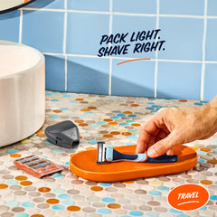 Dollar Shave Club grey razor cover protects blades during travel