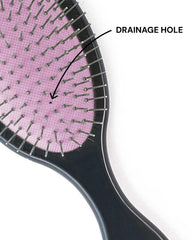 Dom Dom detangling brush suitable for all hair types and lengths.